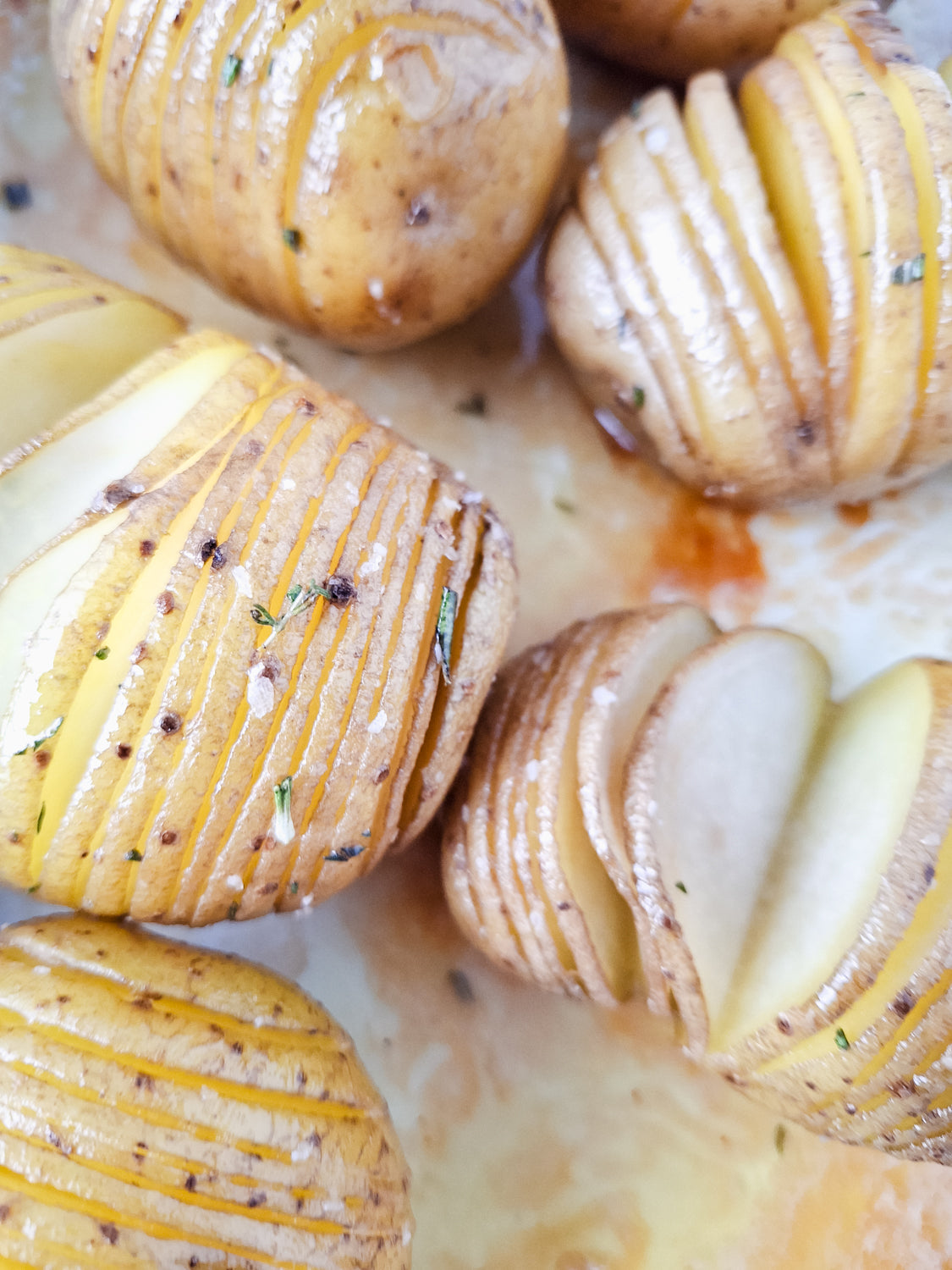 Semi-Exclusive: Honey Butter & Herb Hasselback Potatoes on Smoke