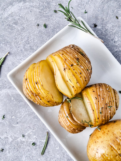 Semi-Exclusive: Honey Butter & Herb Hasselback Potatoes on Smoke