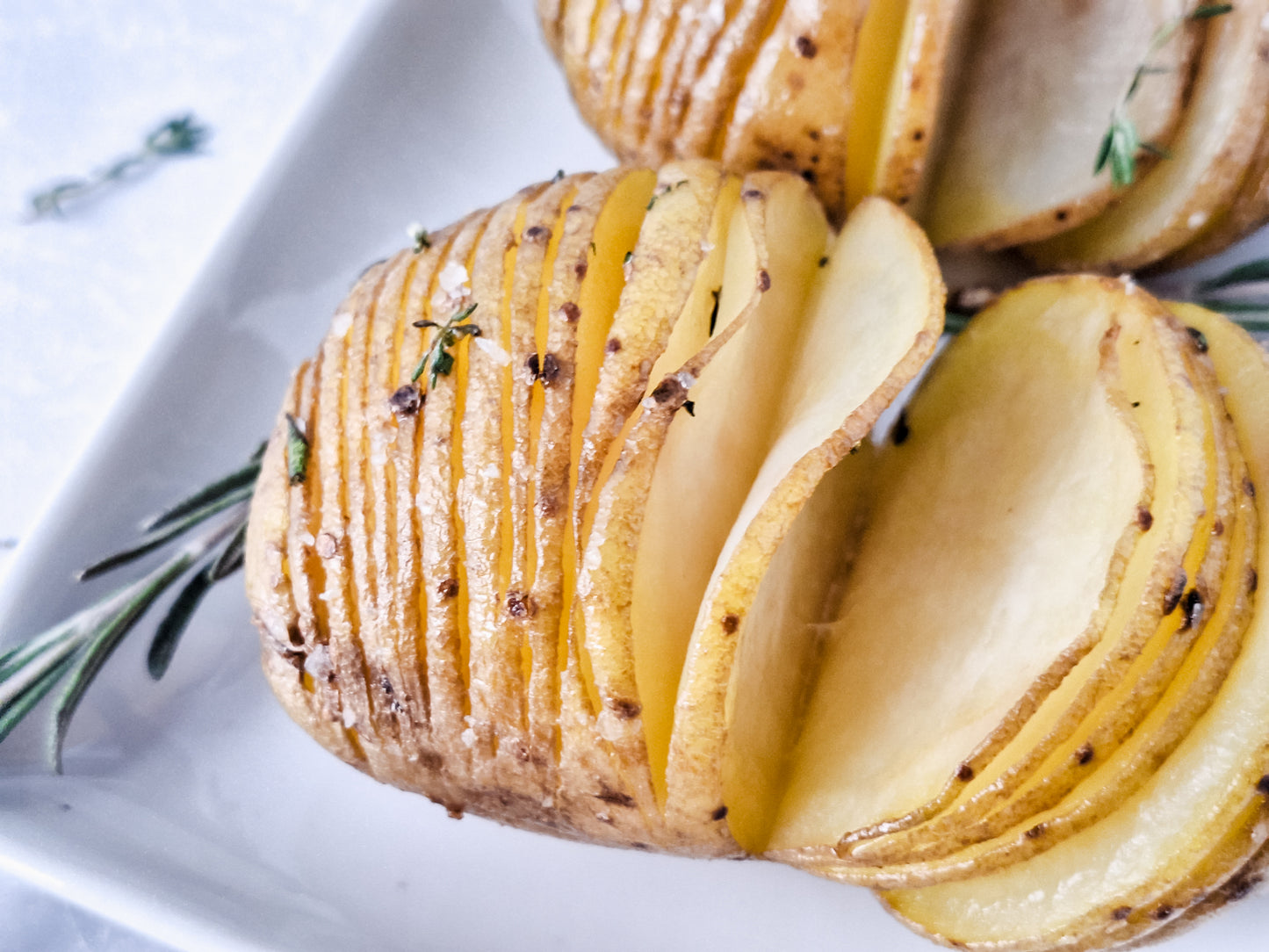 Semi-Exclusive: Honey Butter & Herb Hasselback Potatoes on Marble